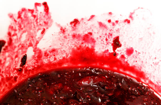istock A bowl of red liquid with a red stain on the side 2254127420