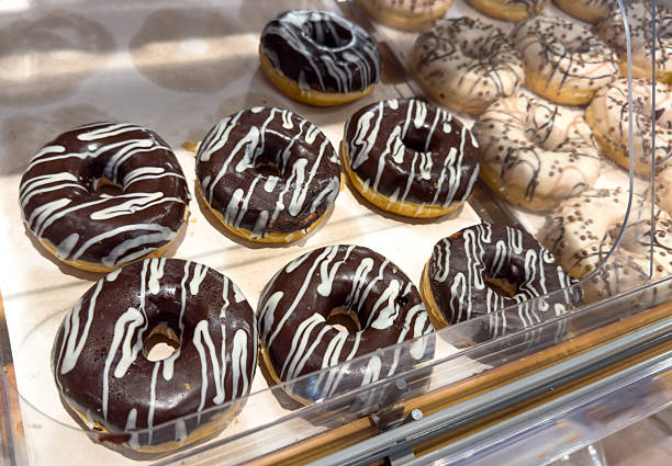 istock A display of donuts with chocolate and white stripes 2254127454