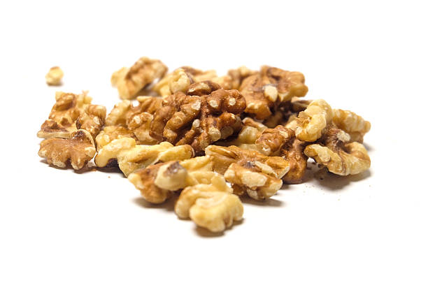 istock peeled roasted walnut, isolated on white background 2254129070
