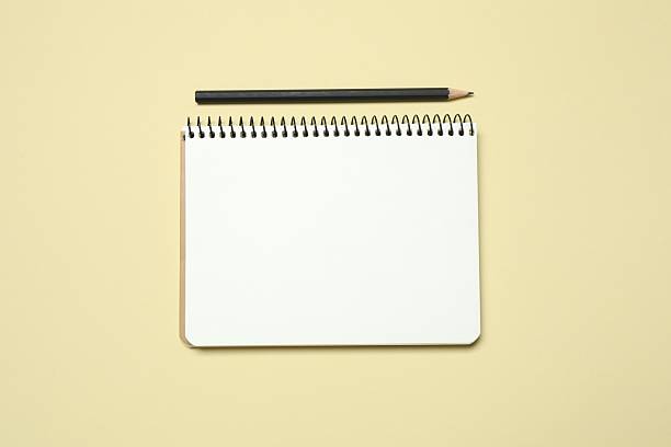 Flat lay with pencil and notebook on color background, top view