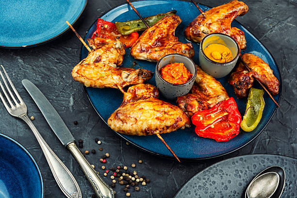 istock Grilled Chicken Wings for BBQ Menu 2254130311