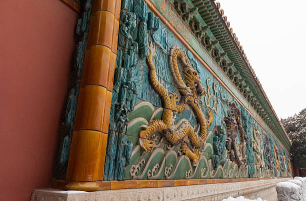 istock winter glazed tile Nine-Dragon screen Wall at the Forbidden City 2254131951