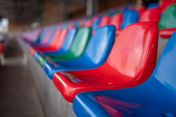 istock Vibrant Stadium Chairs in a Row 2254132734