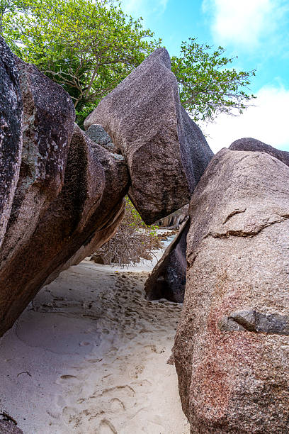 Black granitre rocks of the Giant Union Rock. Natural landmark of La Digue, Seychelles
