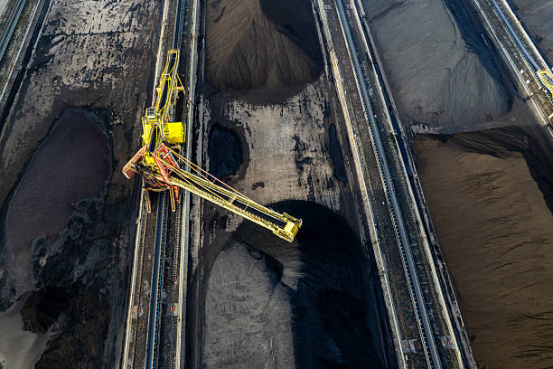 istock The mechanical equipment in the coal field is transporting coal 2254137928