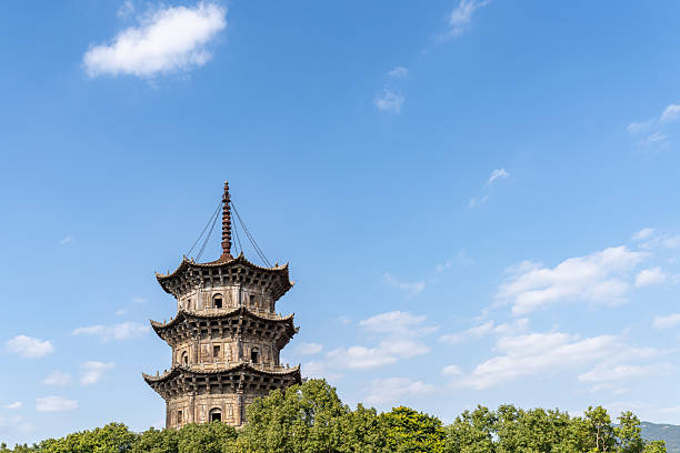 On a sunny day, the ancient stone tower between the forestThe Twin Towers of Kaiyuan Temple in Quanzhou City, Fujian Province.