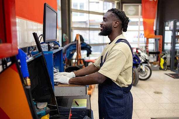 istock Male mechanic repairing motorcycle 2254140138
