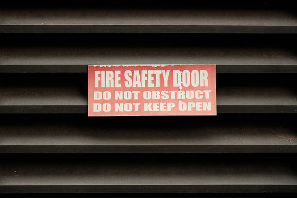 Fire safety door sign on a vented door