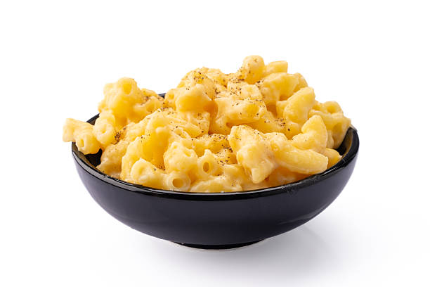 istock Delicious mac and cheese in a bowl on white background 2254142817