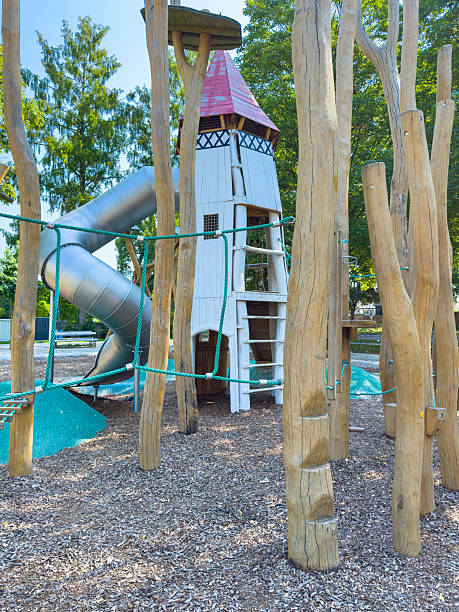 istock This is a delightful and playful outdoor structure that features a fun slide, beautifully surrounded by natural wooden posts, creating an ideal space for childrens recreation and enjoyment 2254147838