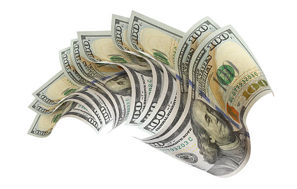 istock Flying hundred dollar banknotes, isolated on white background 2254152129