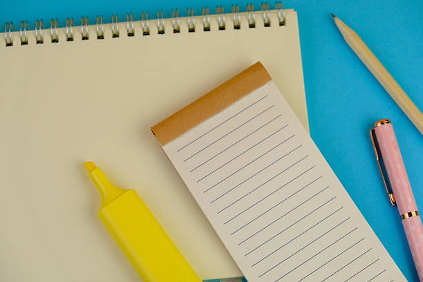 paper on yellow background. Empty Space for your text. business and education concept