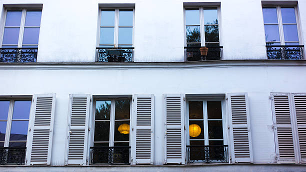 Paris, France: Old White Residential Building with Shutters, 11th. Shot on Rue Jean-Pierre Timbaud.