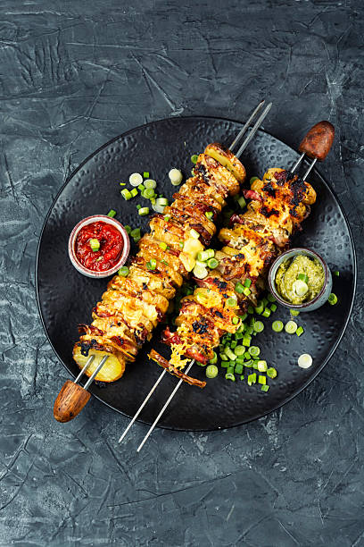 istock Grilled vegetable bacon kebabs, summer barbecue. 2254163774