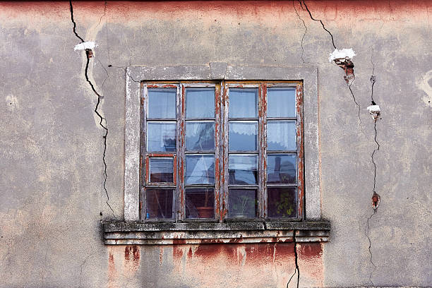 istock Old wooden window in the emergency house 2254165325