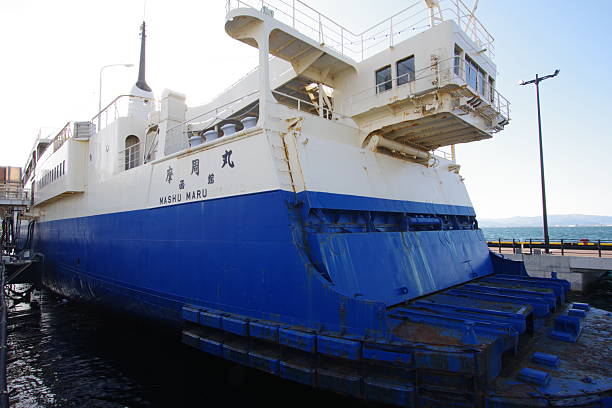 Hakodate, Hokkaido Japan - April 30, 2022: This is the Mashu Maru, a Seikan Ferry that once connected Honshu and Hokkaido.It was retired with the opening of the Seikan Tunnel in 1988.It is now a museum ship on display at Hakodate Port.The Mashu Maru sailed between Hakodate and Aomori, carrying railroad freight cars and passengers.It measured 8,328 t, 132m long, and 17.9m wide, with a passenger capacity of 1,200 and 48 carriages.It traveled between Aomori and Hakodate in 3 hours and 50 minutes.