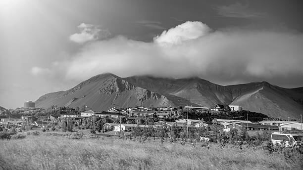 Panoramic sunset over Borgarnes town Iceland featuring coastal landscape and dramatic clouds.