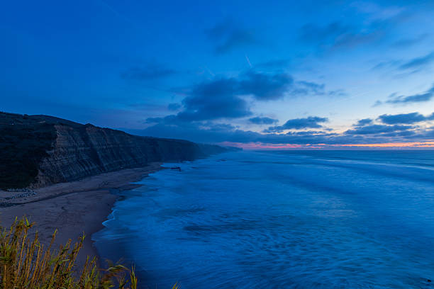 Long exposure at the beach of Magoito in a winter day, Sintra, Portugal