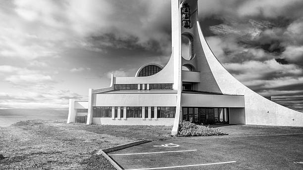 Panoramic summer landscape featuring Stykkisholmur church Iceland with charming streets and fjord.