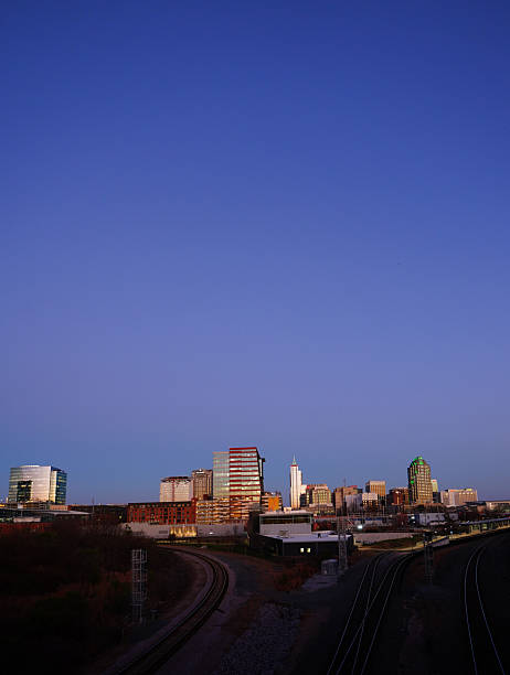 istock The downtown Raleigh skyline and railroad tracks at sunset 2254176803
