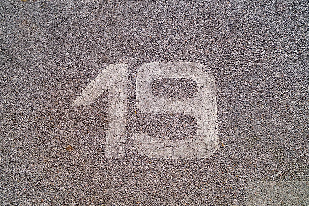 19 number nineteen on the sidewalk