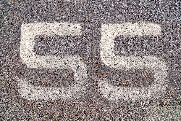 istock 55 number fifty-five on the sidewalk 2254187450
