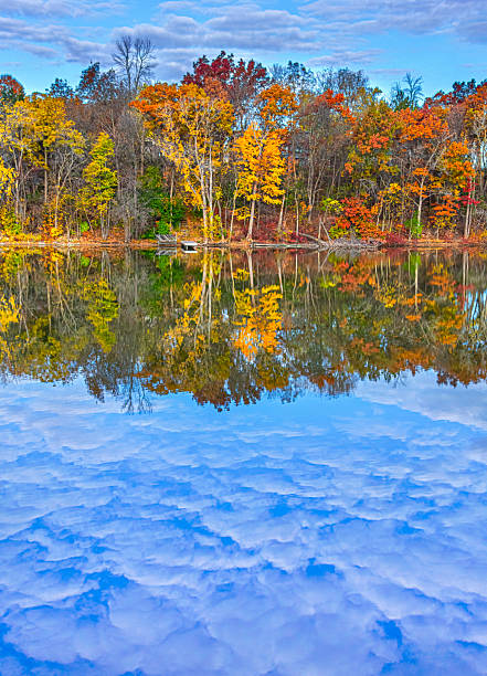 Amazing Autumn colors reflected in tranquil Wisconsin waters.