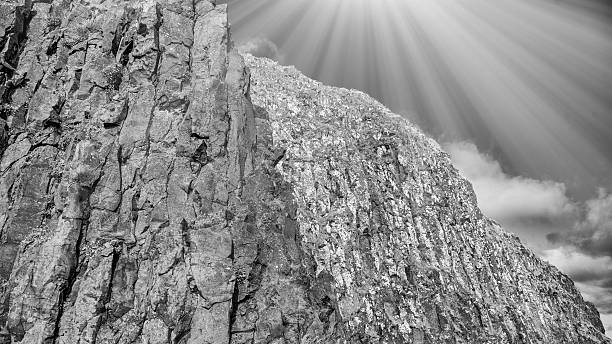 Panoramic Icelandic coastal scene featuring Stykkisholmur mountains and dramatic rocks.