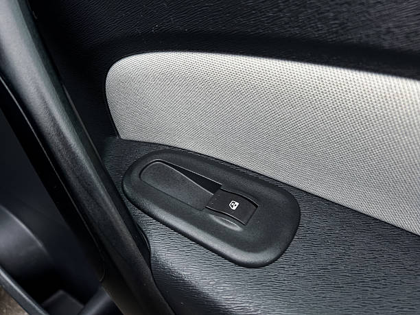 istock CloseUp of a Power Window Control Switch on a Vehicle Door Panel 2254192882