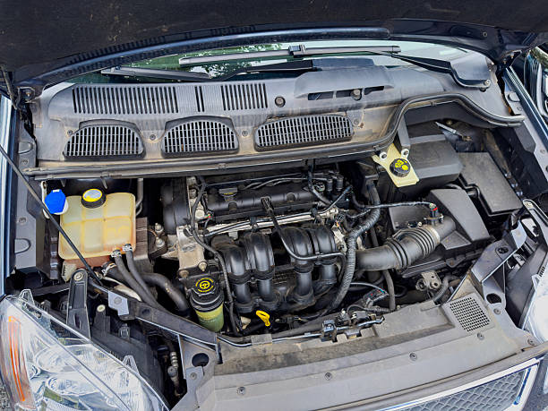 istock Engine components reveal intricate mechanics and hidden power within a modern vehicle during a sunny afternoon 2254199173