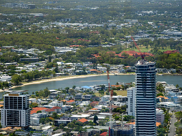 Gold Coast, Australia - October 23, 2014: Helicopter fly above Surfers Paradise Skyline. It one of Australia's iconic coastal tourist destinations, drawing about 10 million tourists every year from all over the world.