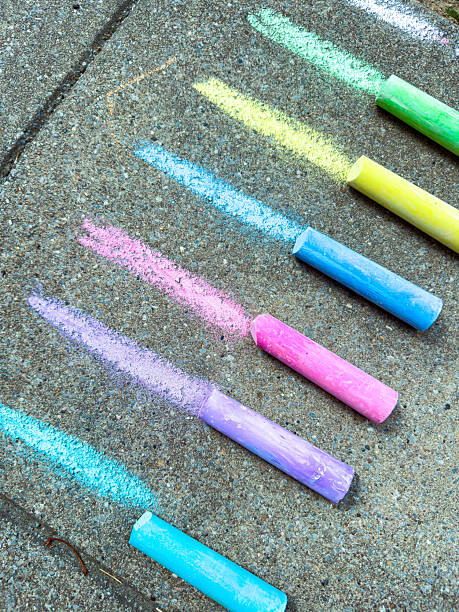 istock A vibrant collection of chalk sticks is artistically arranged on a textured surface, offering opportunities for outdoor art projects and inspiring creativity and expression in all ages 2254201160