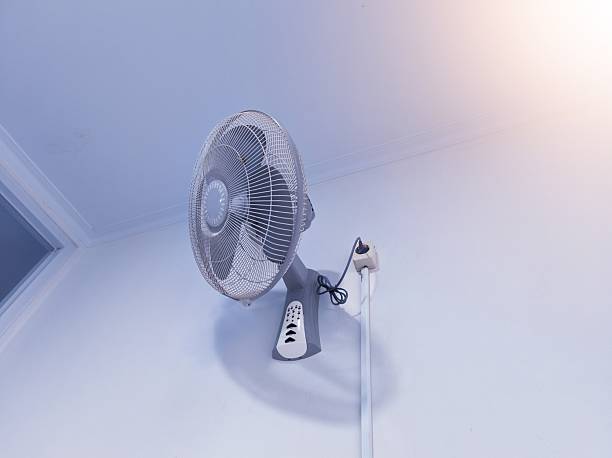 istock wall fan in the room with a room cooling concept 2254201998