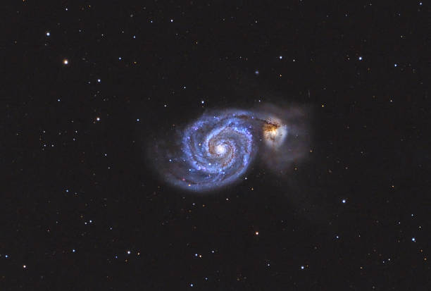 istock M51 Whirlpool Galaxy group in Canes Venatici, gravitational interaction between M51 and NGC 5195 2254202276