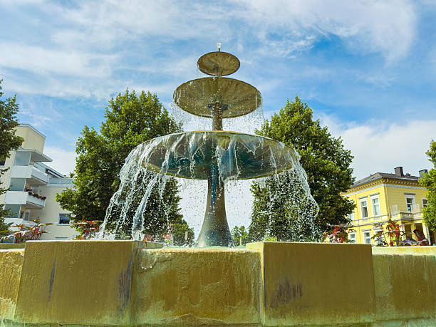 fountain in front of water tower in Mannheim at sunset