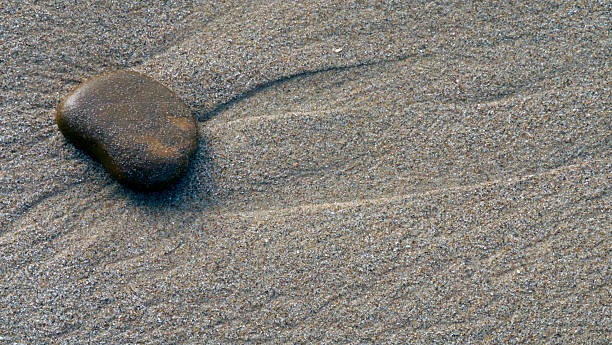 istock CA Ventura Beach Lone Stone on Sand  2025 2254208927