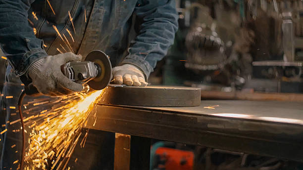 istock Metal structure manufacturing process with polishing and grinding of elements using power tools 2254210605