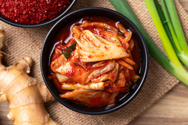 istock Korean Kimchi cabbage in a bowl with ingredients 2254213517