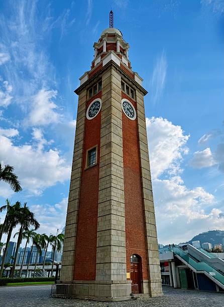 Hong Kong - February 13, 2024 : Hong Kong Cultural Centre and Former Kowloon-Canton Railway Clock Tower in Hong Kong.