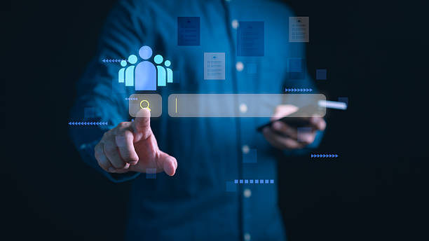 istock Businessman using digital recruitment interface with search bar to find candidates online. Concept of HR technology, job search, hiring process and human resources management. 2254216002