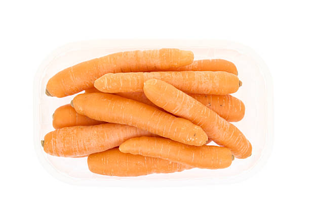 istock Carrots isolated on white background.Top view. 2254220588