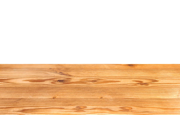 istock A top-down view of a wooden table or tabletop, separated from a white background. 2254222977
