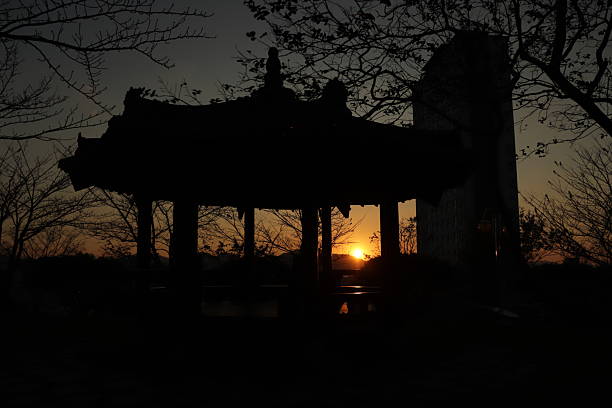 istock Asian Pavilion Silhouette Against Golden Sunset 2254223968
