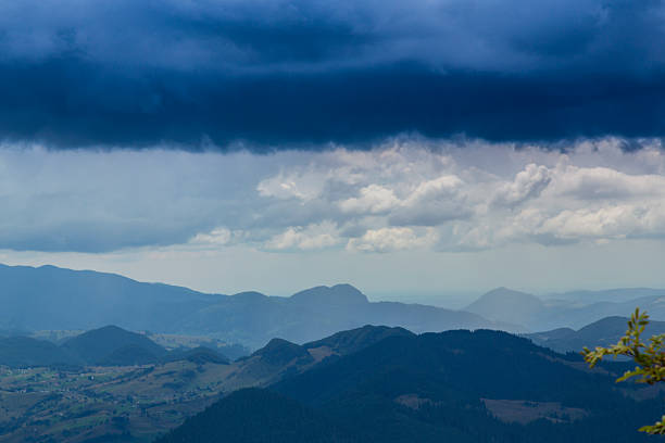 Summer scenery in the Transylvanian Alps with spectacular imagery and dramatic storm clouds