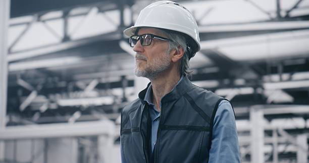 istock Specialist Assessing Production Line Efficiency on Site 2254229106