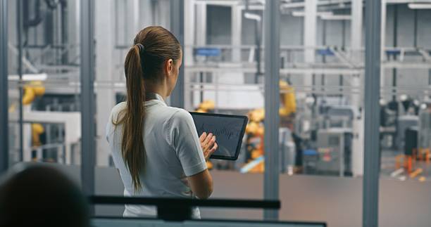 istock Female Engineer Managing Production Via Tablet 2254229778