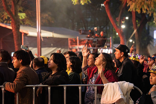 Mexico City New Year Celebration, people dancing, enjoying the free concert at the Angel of the Independence, 2026