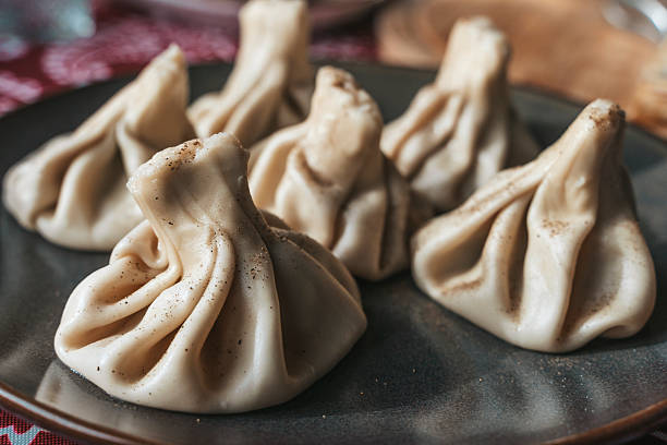 istock Traditional Georgian Khinkali Dumplings on a Plate 2254230469