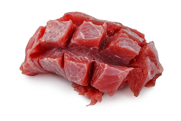 istock Raw beef stew meat, pre cut into lean chunks isolated on a white background 2254238648