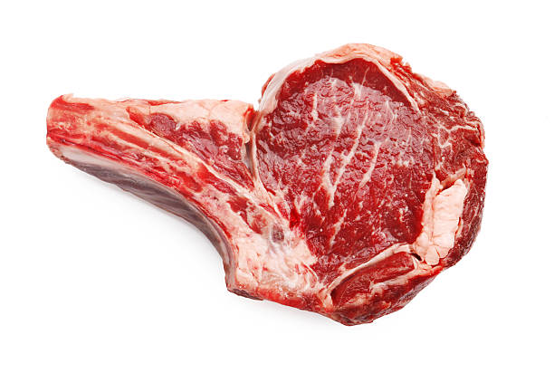 istock Piece of raw beef meat isolated on white, top view 2254243149